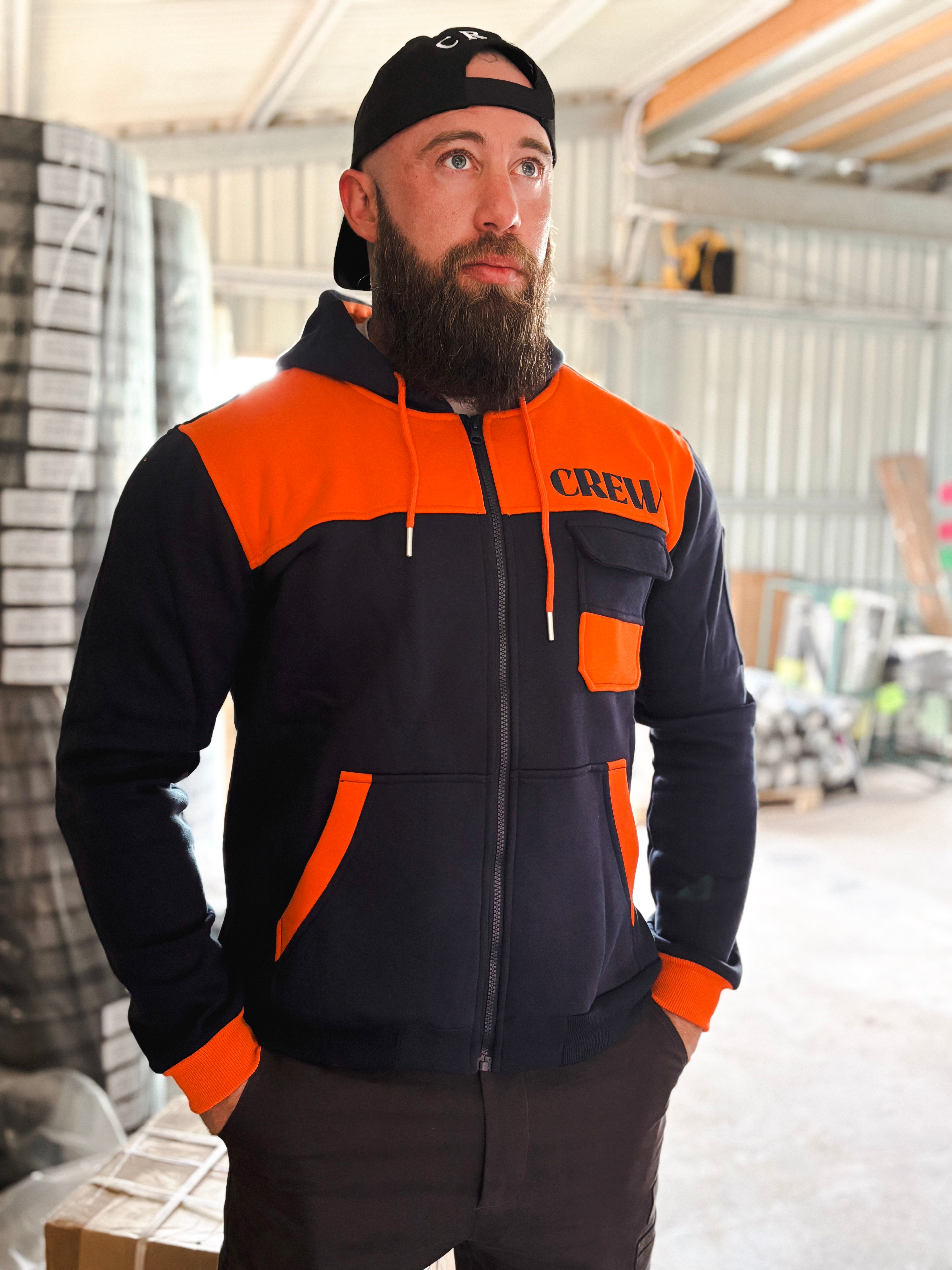 CREW tradie workwear jacket in navy and orange designed for durability and everyday wear